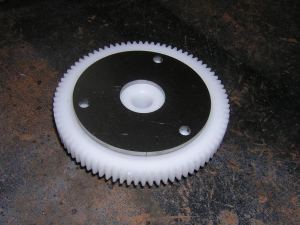 Delrin gear with metal spacer on top.